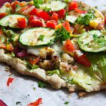 Crunchy Cauliflower Crust Pizza Loaded with Fresh Veggies